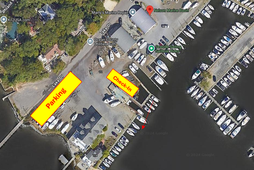 Aerial view of marina with labeled parking and check-in areas.