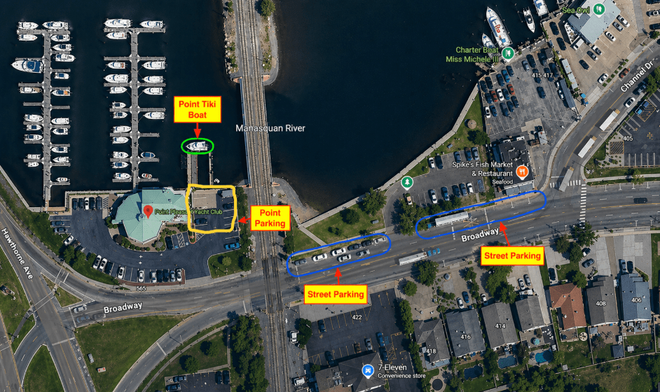 Aerial view of parking areas near a river and marina with labeled zones.
